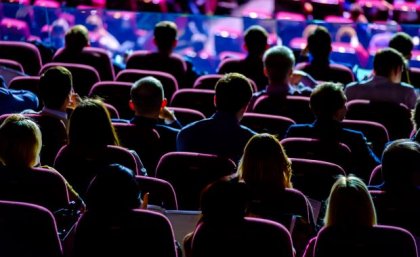 People sitting in a crowd