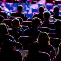 People sitting in a crowd
